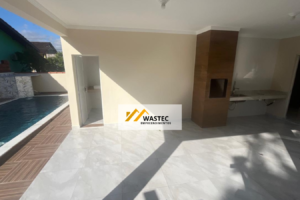 Ref.: R$ 897.000,00 Casa térrea com três dormitórios e uma maravilhosa área de lazer com piscina (80468)